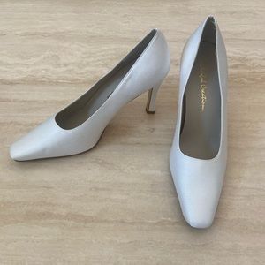 Women’s white satin shoes. Great for dying. Size 10 4” heel. Brand new in box.